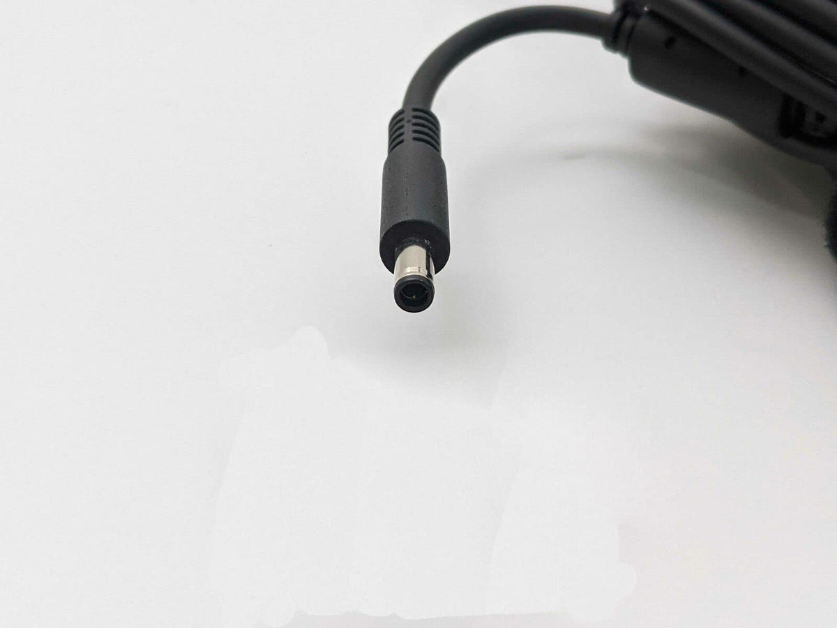 WEALLGOOD 65W Dell Inspiron charger back view showing label and warranty.