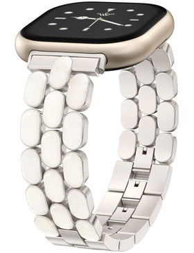 Wearlizer resin metal band on the wrist, showing a sleek Versa 4 dressy look