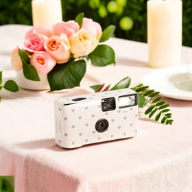 Weddingstar camera on a guest table offers easy keepsakes from events.