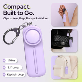 WETEN alarm in hand for scale showing lightweight size for everyday carry