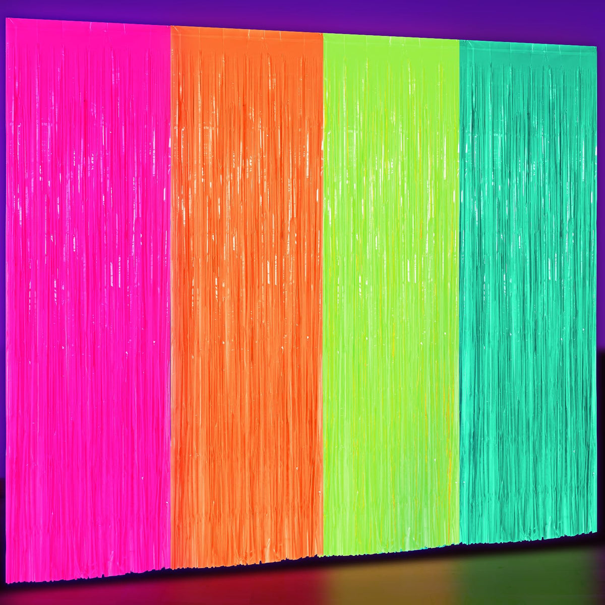 Weysat glow in the dark green fringe curtain enhances a vibrant party backdrop