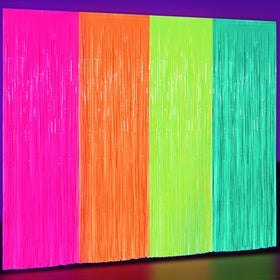 Weysat glow in the dark green fringe curtain enhances a vibrant party backdrop