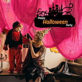 Whaline indoor party backdrop in hot pink transforming room into vibrant haunted scene