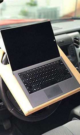 Wheeldesk stowed next to console showing easy compact storage benefit