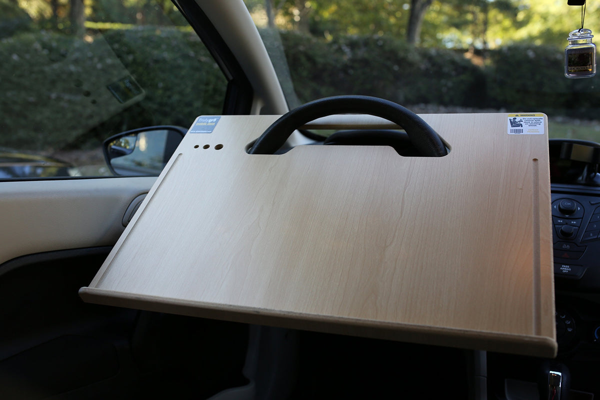 Wheeldesk top surface with laptop demonstrating roomy workspace benefit