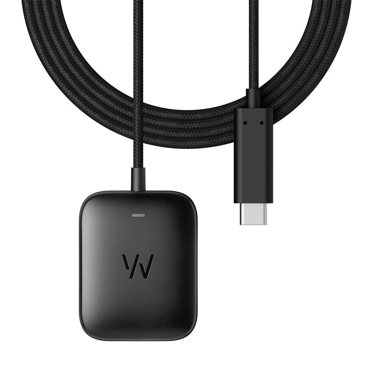 WHOOP charger next to keys for scale indicating travel-ready compactness benefit