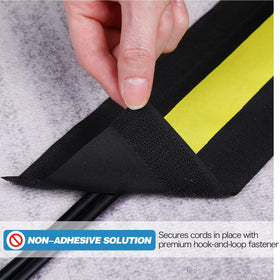 WILLBOND cord cover being trimmed to length with scissors for custom fit