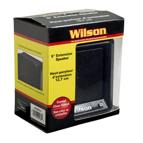 Wilson size comparison in hand showing compact speaker that saves dash space
