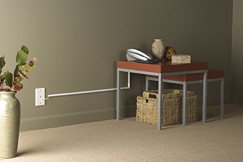 Wiremold installed behind a floor lamp in living room — hides cord for cleaner decor