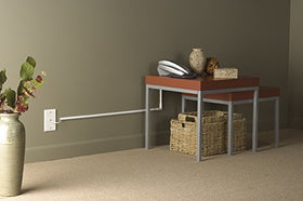 Wiremold installed behind a floor lamp in living room — hides cord for cleaner decor