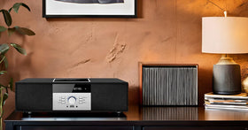 WISCENT headphone port and remote control offer private listening and convenient navigation.