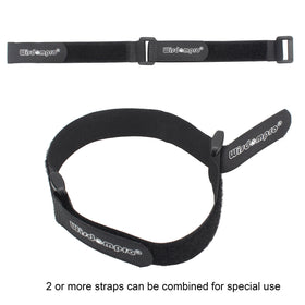 Wisdompro reusable ties tidying a power strip and electronics.