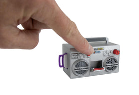 World's Smallest close-up of included USB stick and port — instant music playback