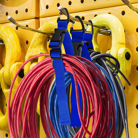 Wowangce versatile storage for hoses and large wires in workshop.