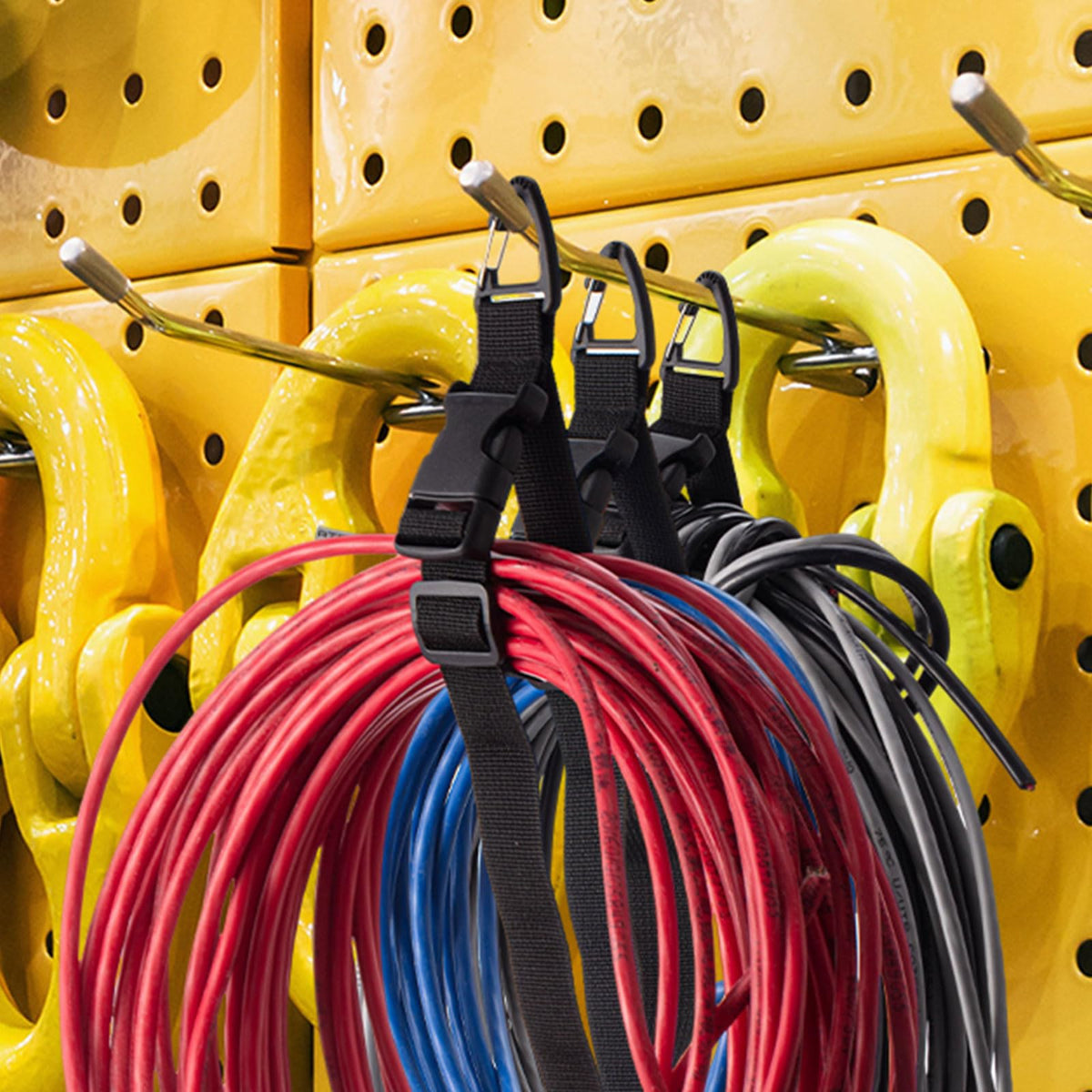 Wowangce holding a garden hose neatly in a shed to save space