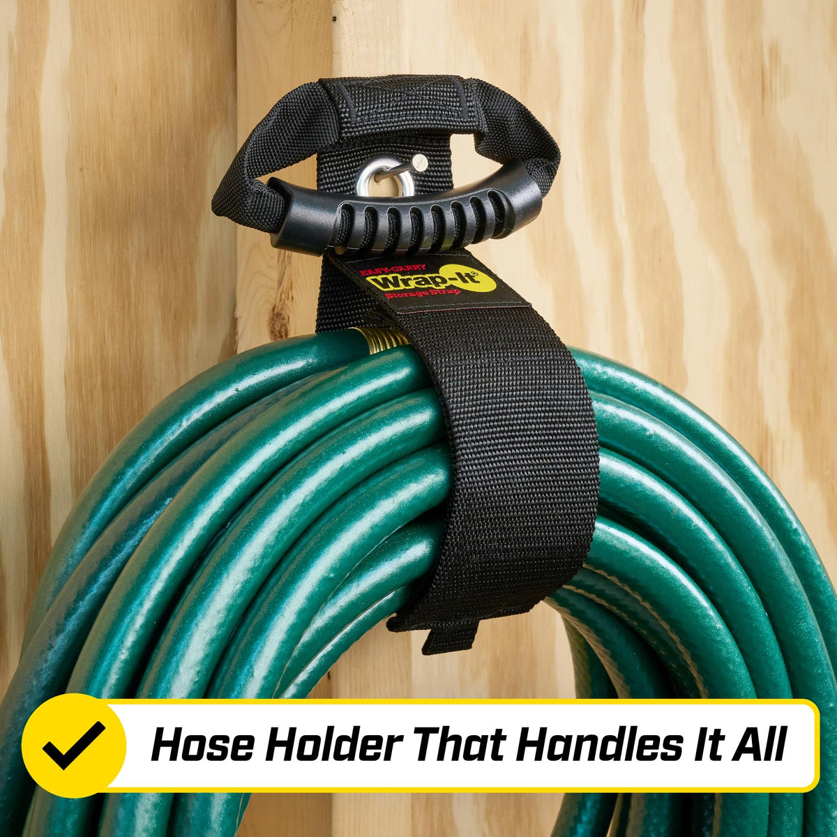 Wrap-It strap with handle carries and organizes rope in workshop.