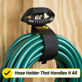 Wrap-It strap with handle carries and organizes rope in workshop.