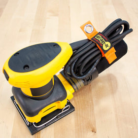 Wrap-It Heavy-Duty 7-inch strap cord hanger keeps extension cords tidy and ready.