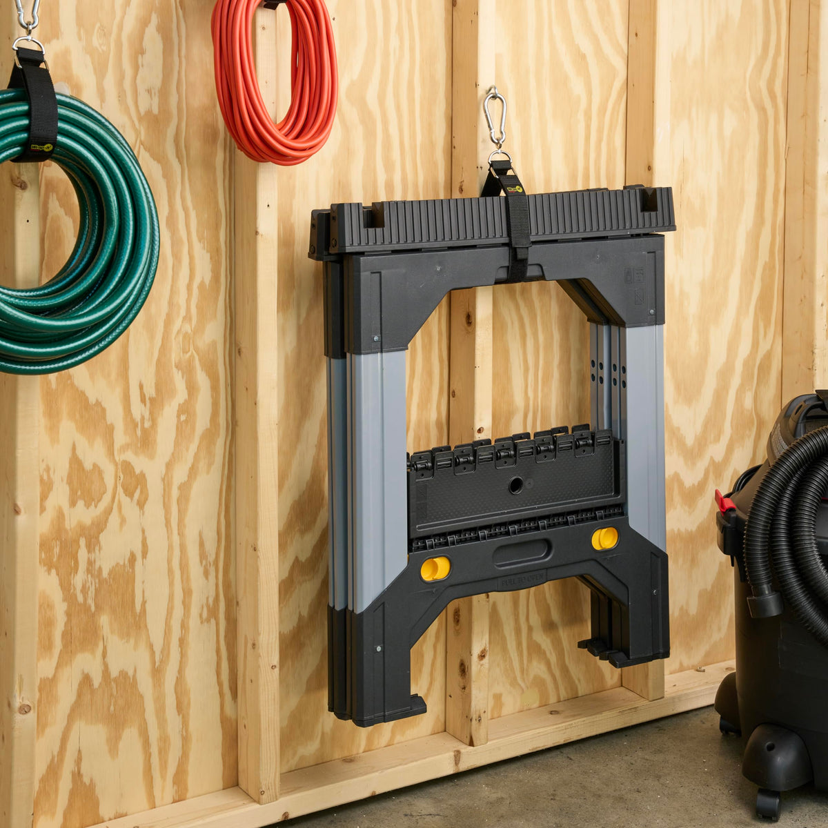 Wrap-It Hook 'n Hang organizing garden hose efficiently.