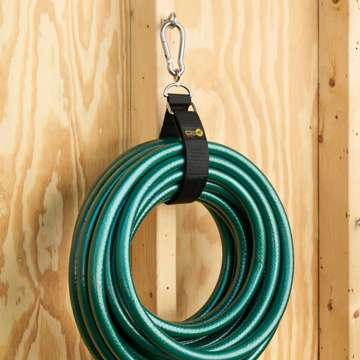 Hook 'n Hang strap in a garage setup keeping tools organized.