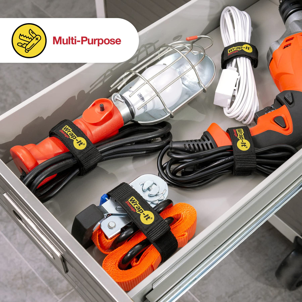 Garage scene with Wrap-It Quick-Straps organizing tools and cables.