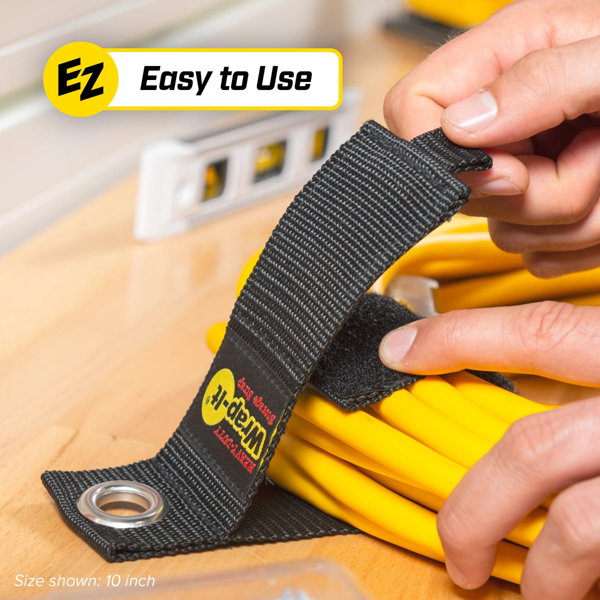Wrap-It RV hose storage strap keeping hoses tidy on board.
