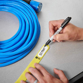 Extension cord organized with Wrap-It Cinch-Straps in yellow
