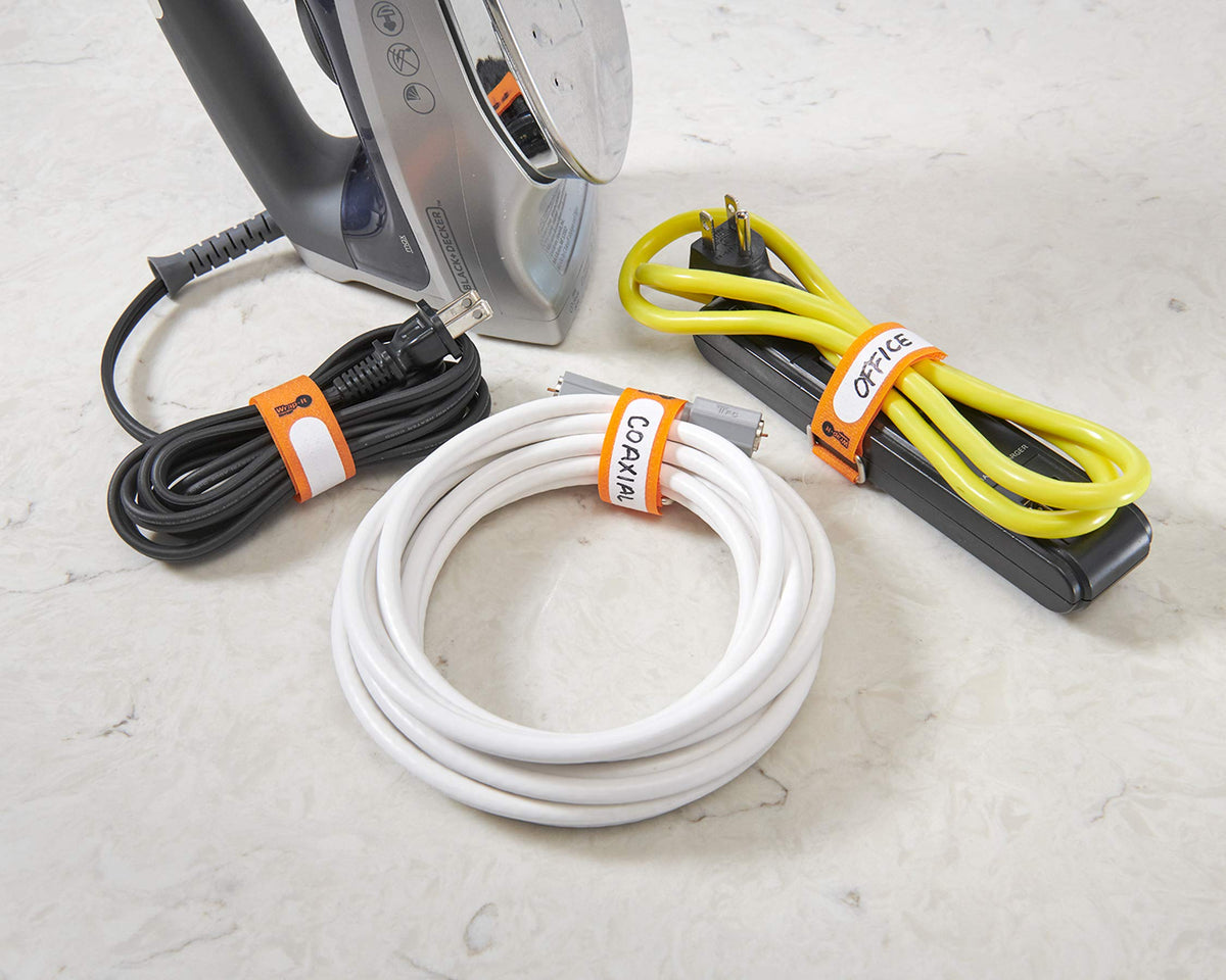 Wrap-It Storage cinch straps in the garage keep wires tidy.