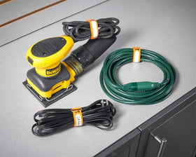 Wrap-It Storage cinch straps on tech cables simplify organization.