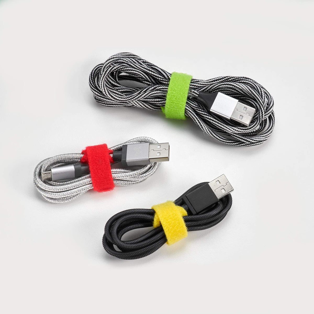 Wrap-It Storage color-sorted straps in pouch for quick access and organization
