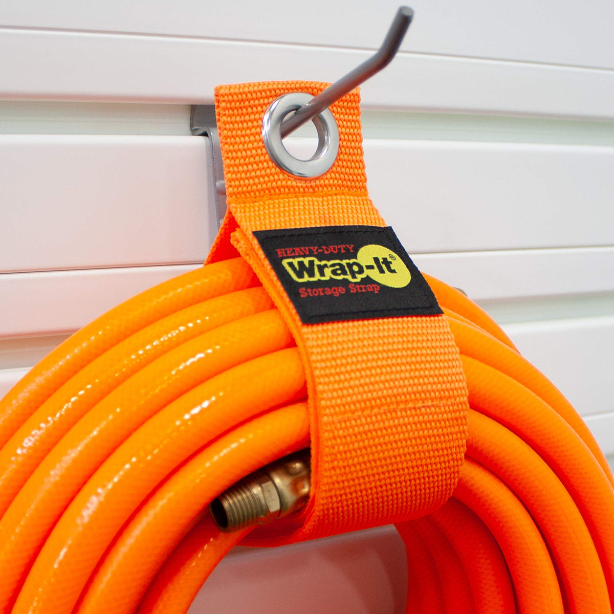 Wrap-It Storage blaze-orange garage gadget organizer in use for quick storage