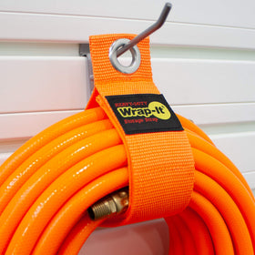 Wrap-It Storage blaze-orange garage gadget organizer in use for quick storage