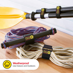 Wrap-It Storage garage organizer strap consolidates tools, cords, hoses.