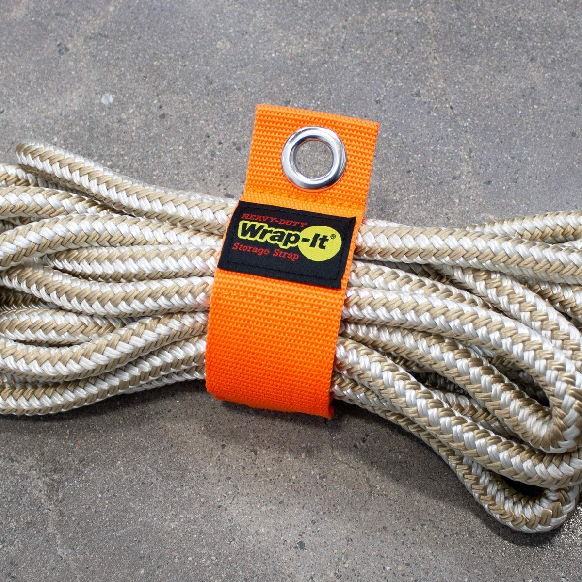 Wrap-It Storage blaze-orange strap shows multi-purpose use for cords, hoses, rope