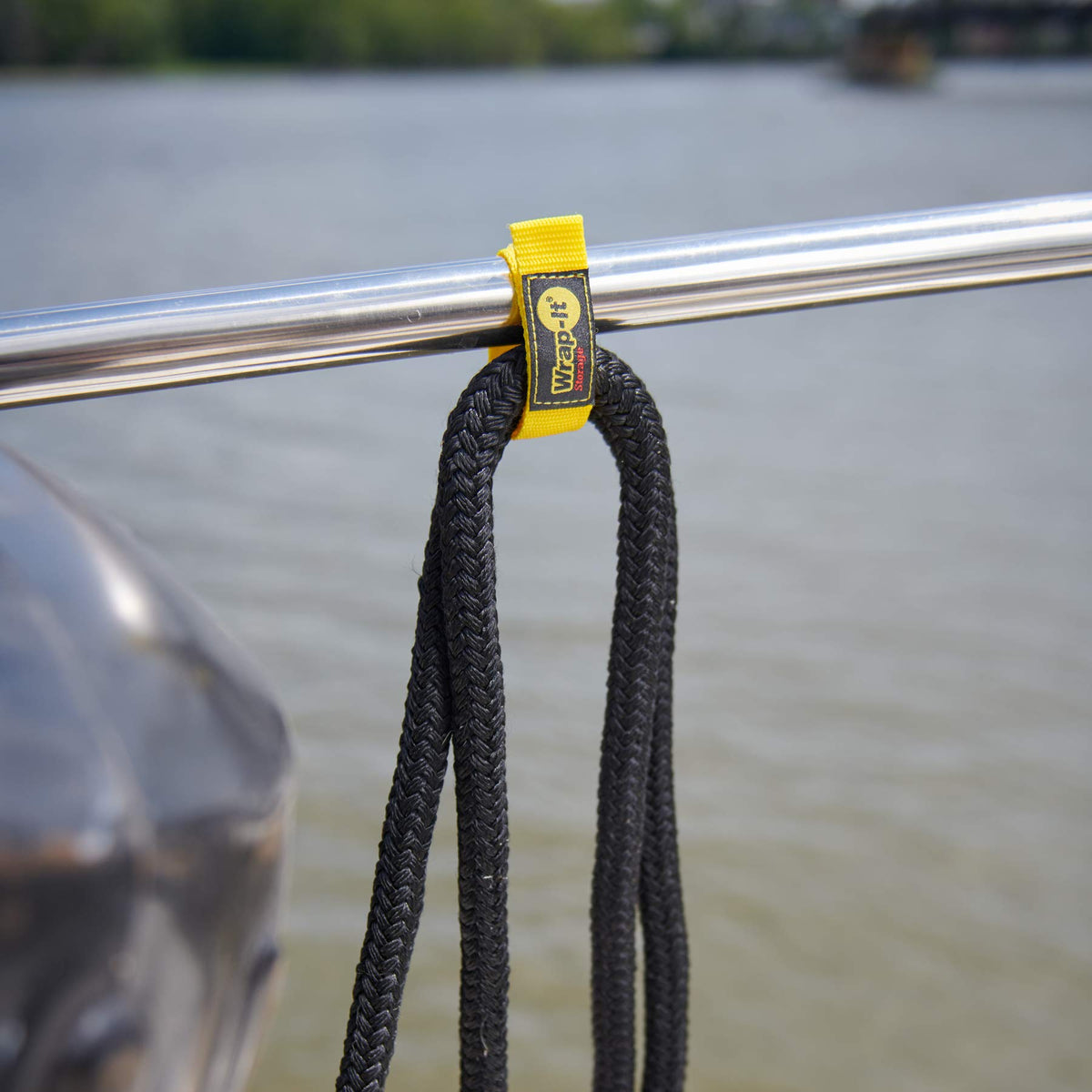 Wrap-It Storage Quick-Straps yellow visibility enhances tool area organization.