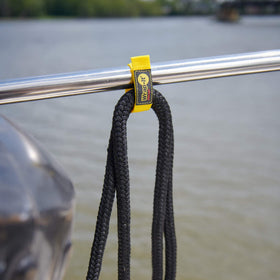 Wrap-It Storage Quick-Straps yellow visibility enhances tool area organization.