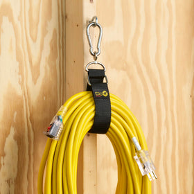 Wrap-It Storage straps beside a ruler showing 12, 18, and 24 inch lengths for scale