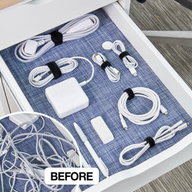 Wrap-It Storage 8in cable ties on a desk for tidier cords