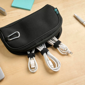Wrap-It Storage close-up shows hook-and-loop grip for durable cord ties