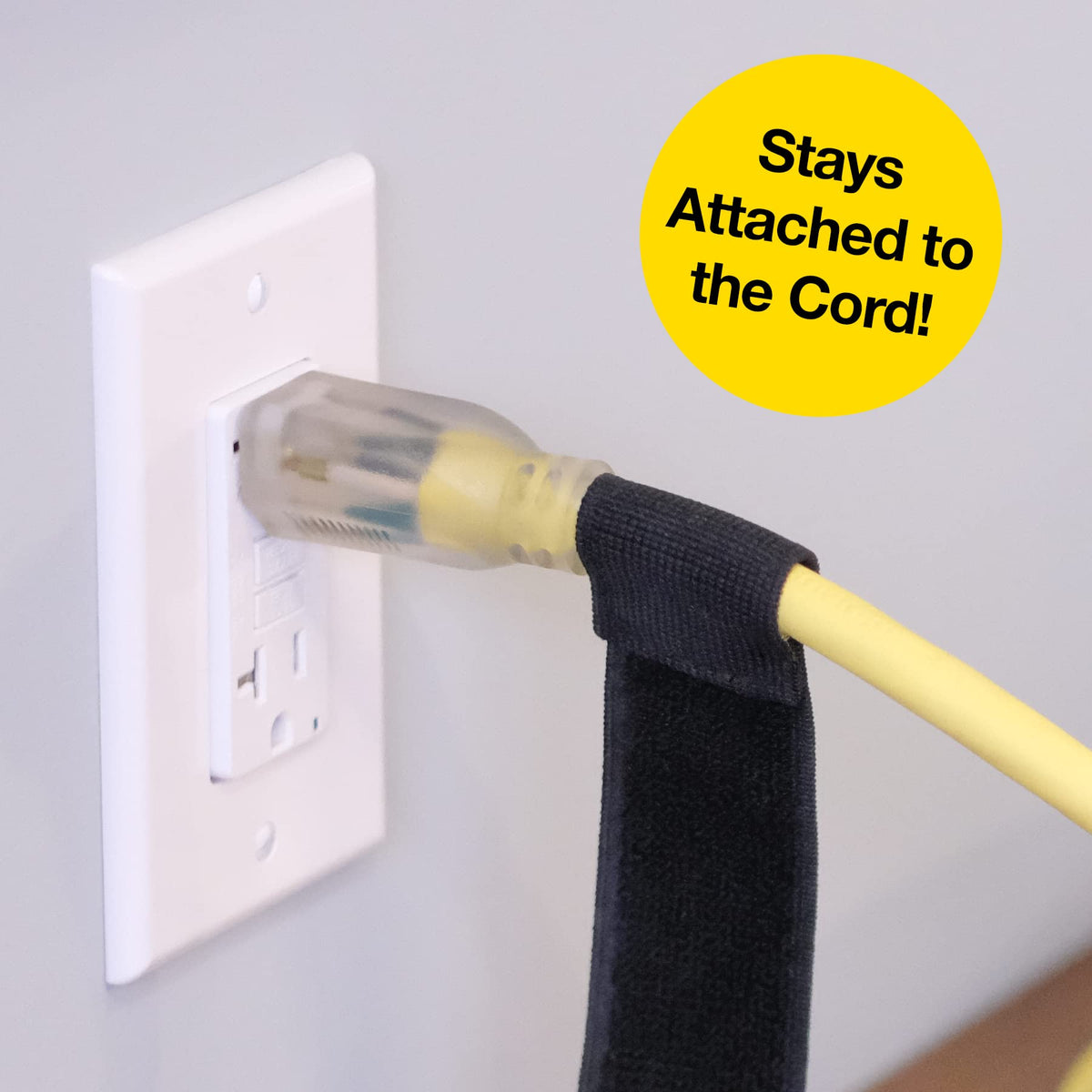 Outdoor extension cord wrapped by weather-resistant Selfie Straps