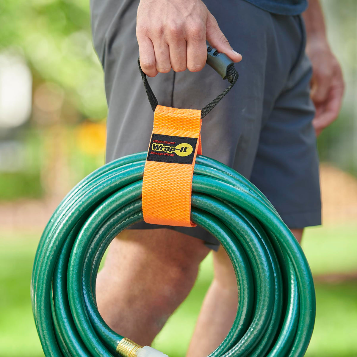 Wrap-It Storage straps with handle organize hoses neatly and ready to use.