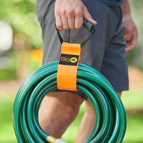 Wrap-It Storage straps with handle organize hoses neatly and ready to use.