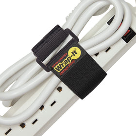 Wrap-It Storage Super-Stretch strap securing extension cords for organized workshop