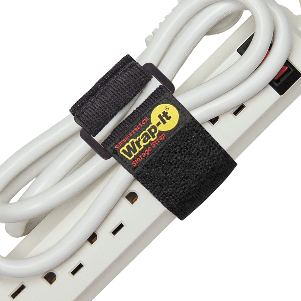 Wrap-It Storage Super-Stretch strap securing extension cords for organized workshop