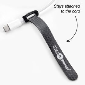 Wrap-It Storage securing charging cables on desk for tidy workspace benefit