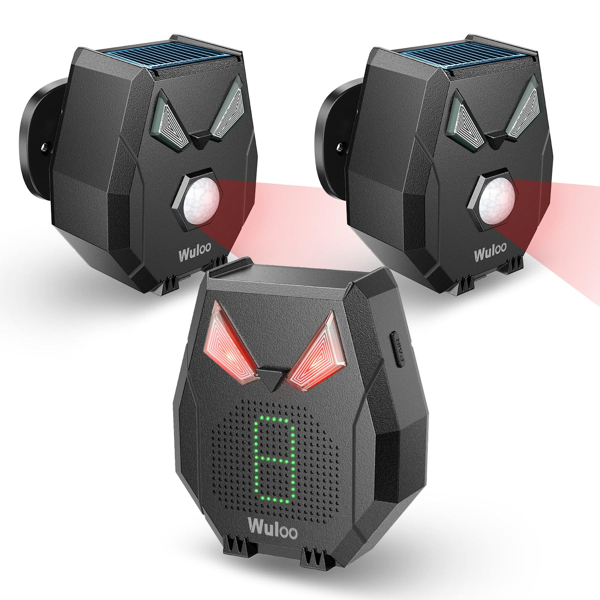 Wuloo solar driveway sensor on a tree for reliable outdoor motion detection.