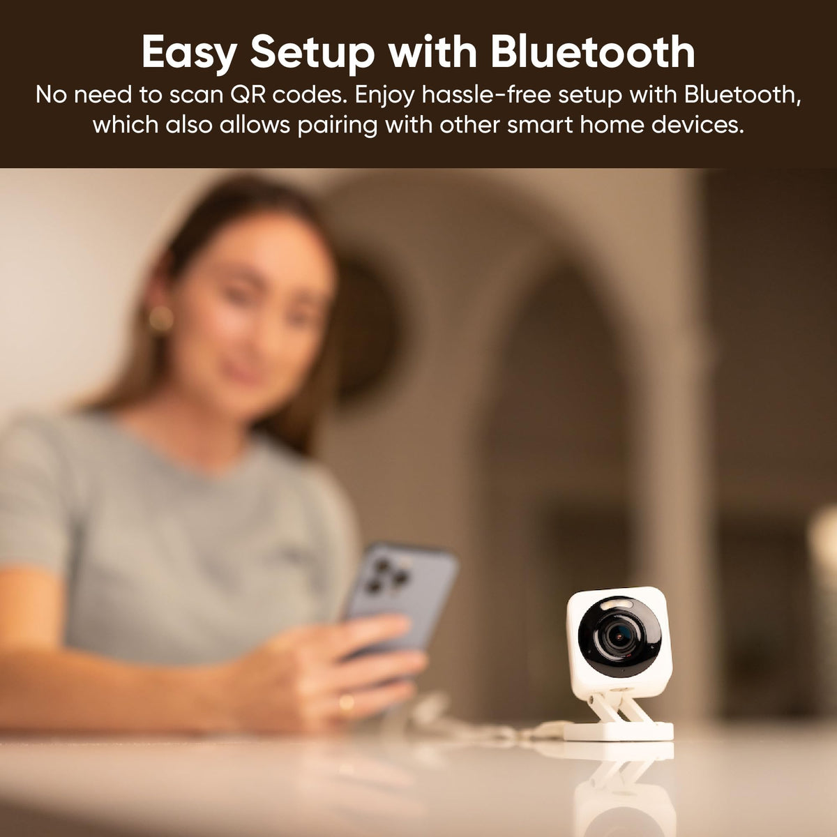 WYZE Cam v4 lifestyle porch installation showing camera overlooking entryway, WYZE enhances home security