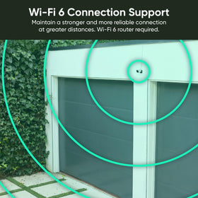 WYZE next to smartphone for scale to show compact footprint and discreet install