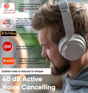 Wyze headphones with voice-isolating microphones on a call setup.