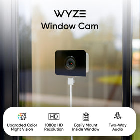 Wyze anti-glare mounting sticker installed to reduce window reflections and improve clarity